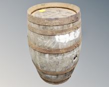 An oak coopered barrel (height 63cm)