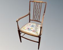 A 19th century mahogany satinwood inlaid open armchair with tapestry seat