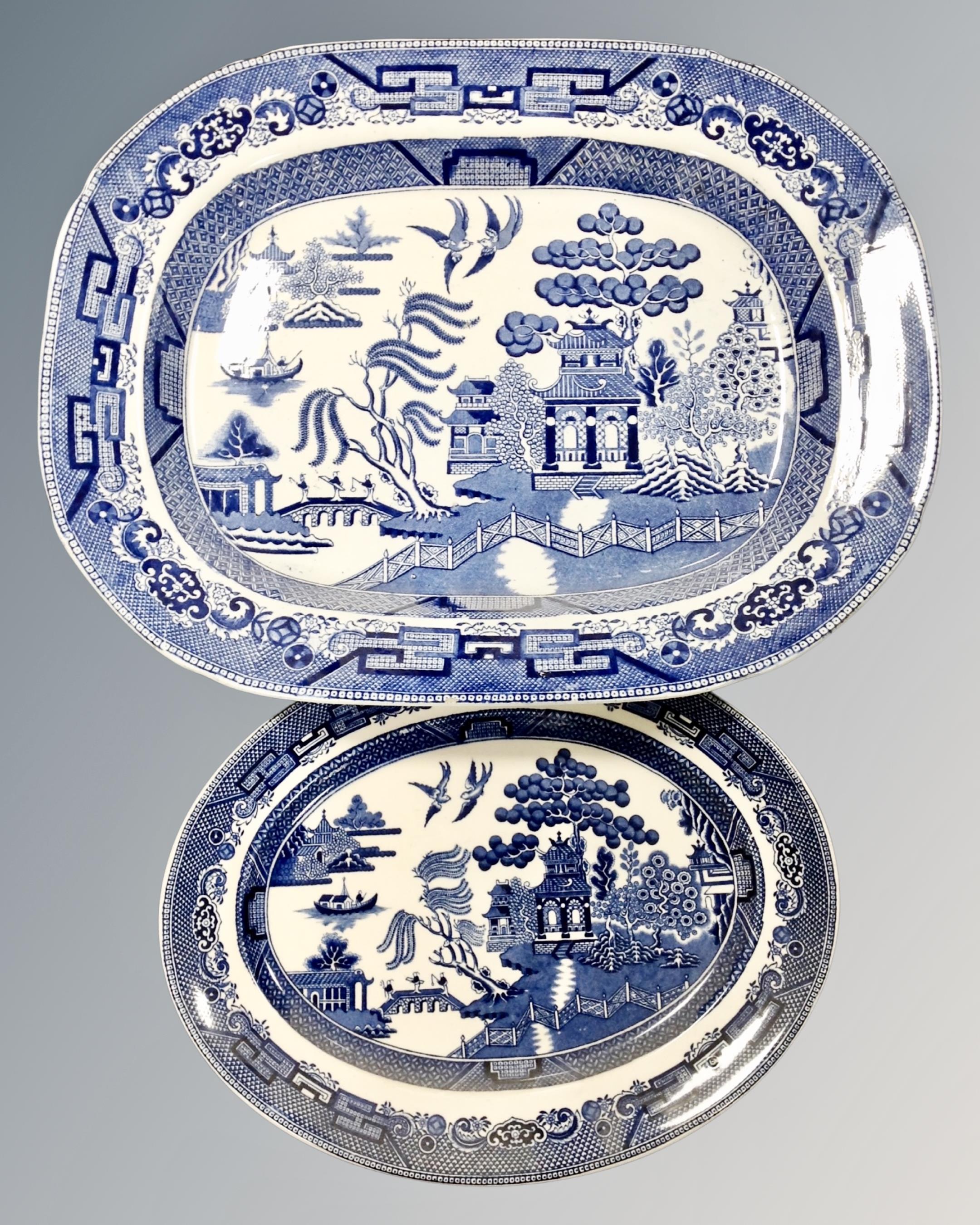A 19th century Ridgeway blue and white willow pattern meat plate (width 43cm) together with one