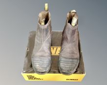 A boxed pair of DeWalt size 9 work boots.