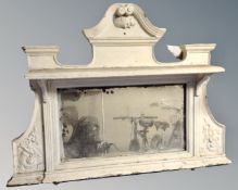 A 19th century painted cast iron overmantel mirror, in distressed condition.