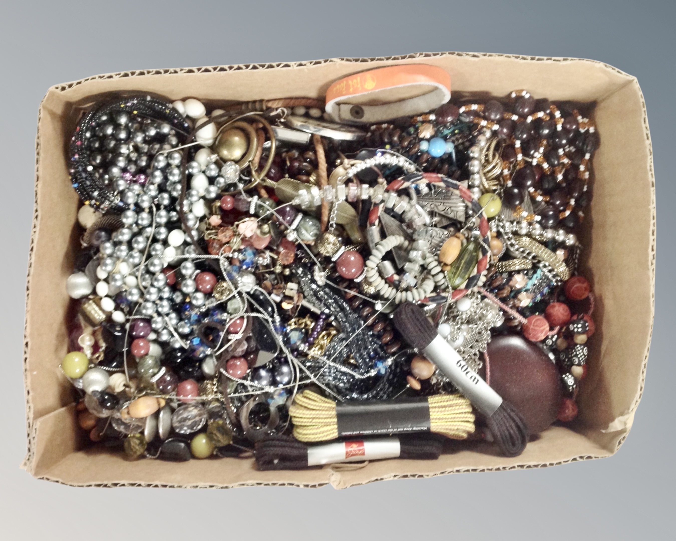 A box of costume jewellery.