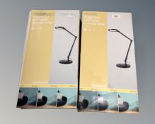 Two boxed LED angle poise lamps.