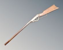 A vintage child's lever action air rifle by the Markham Air Rifle Company.