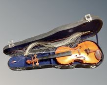 A Stentor Student violin, made in The People's Republic of China, with bow in hard case.