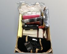 A box containing lady's handbags, Mondini leather wallets, lady's clothing etc.