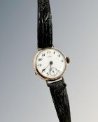 An early 20th century gold plated lady's wristwatch, enamelled dial signed Lanco.