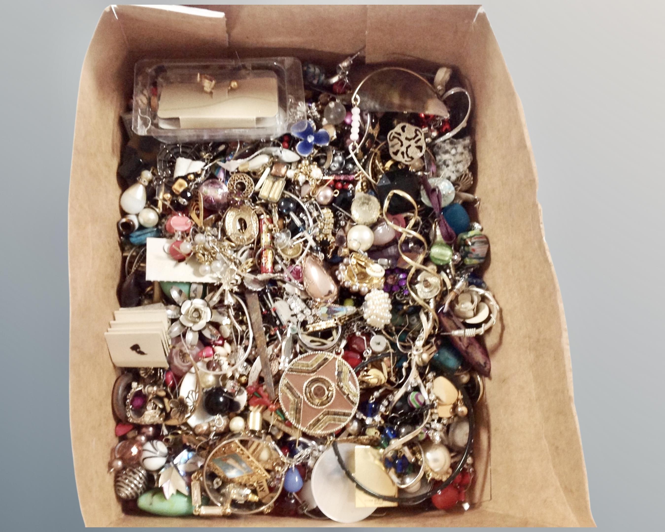 A box of costume jewellery.