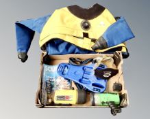 A box containing diving suit and other diving accessories.