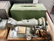 A vintage Jones sewing machine with lead. CONDITION REPORT: no pedal.