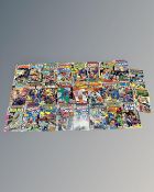 A tray of 50 Marvel comics dating from the 1970s and later, including Captain America, Machine Man,