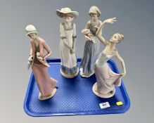 A tray of four Nao figures of ladies.