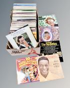 A box of vinyl records including Nat King Cole, Don Williams, Glen Campbell, compilations etc.