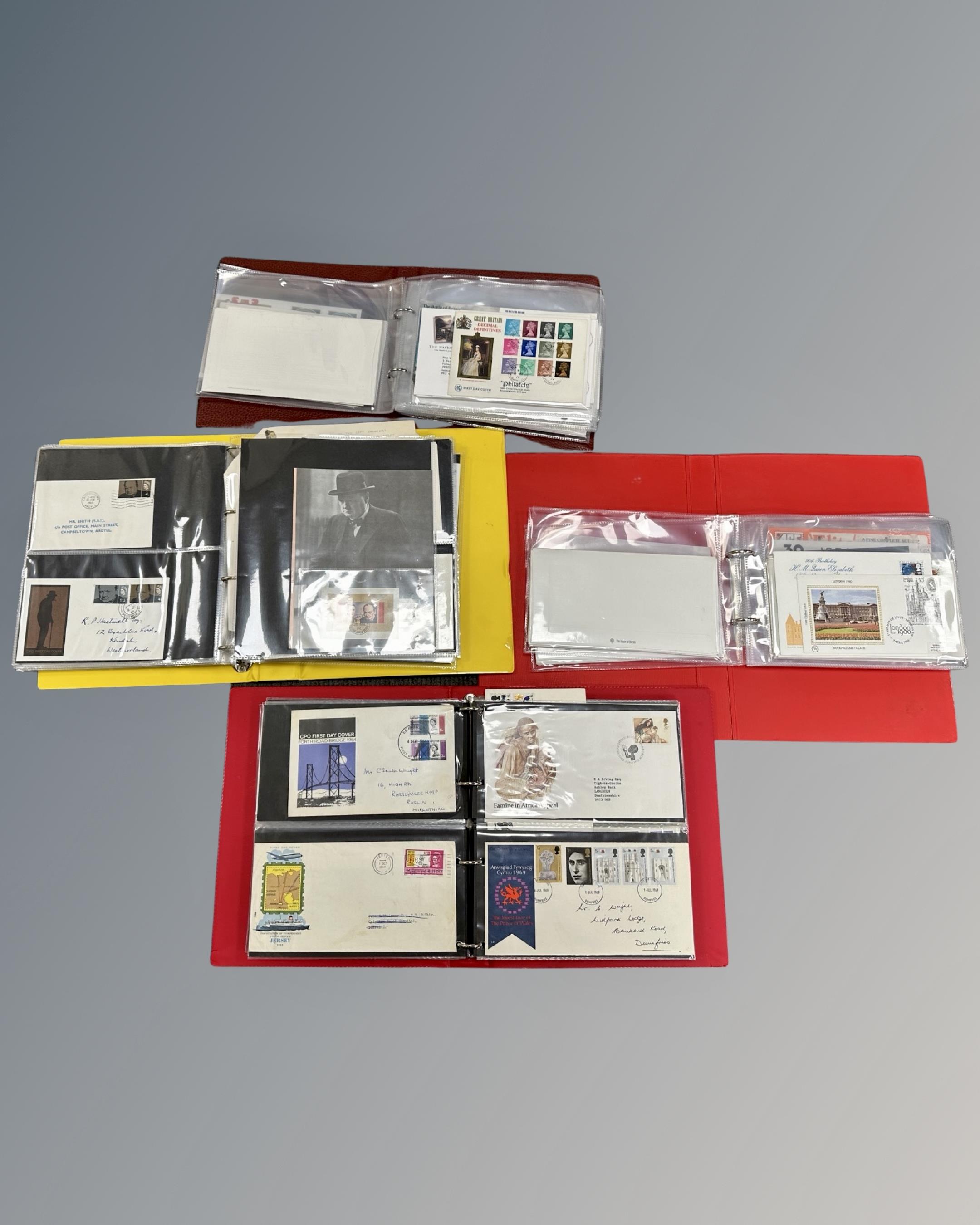 Stamps : Four albums containing over 150 First Day Covers including a large collection of Winston