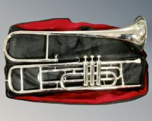 A silver plated trombone in soft carry case.