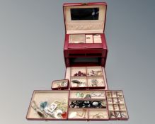 A contemporary jewellery chest containing costume brooches, earrings, necklaces etc.