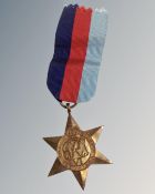 A World War II 1939-1945 Star on ribbon.