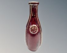 A 1970s glazed pottery bottle vase.