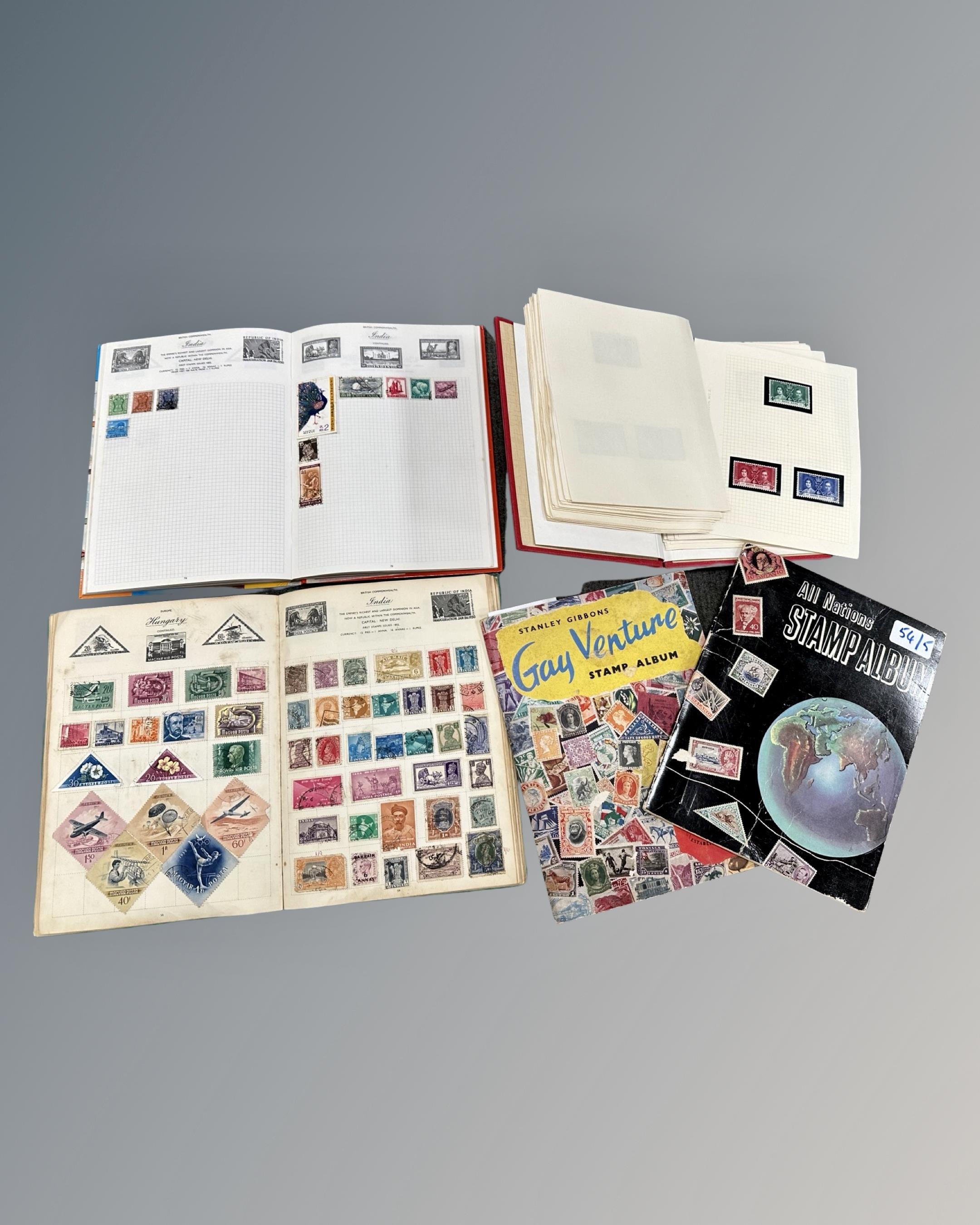 A Stanley Gibbons Gay Venture Stamp Album containing a collection of world stamps,