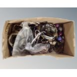 A box of costume jewellery.