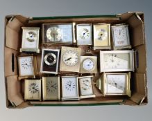 A box of contemporary mostly brass mantel timepieces and carriage clocks.