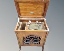 A Rainger gramophone in cabinet.