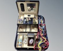 A tray containing contemporary jewellery box containing brooches,