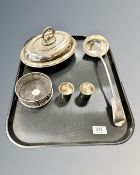A small group of silver-plate comprising a lidded entrée dish, a ladle,