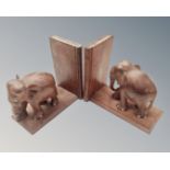 A pair of wooden elephant bookends.