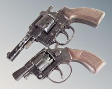 Two vintage starting pistols.