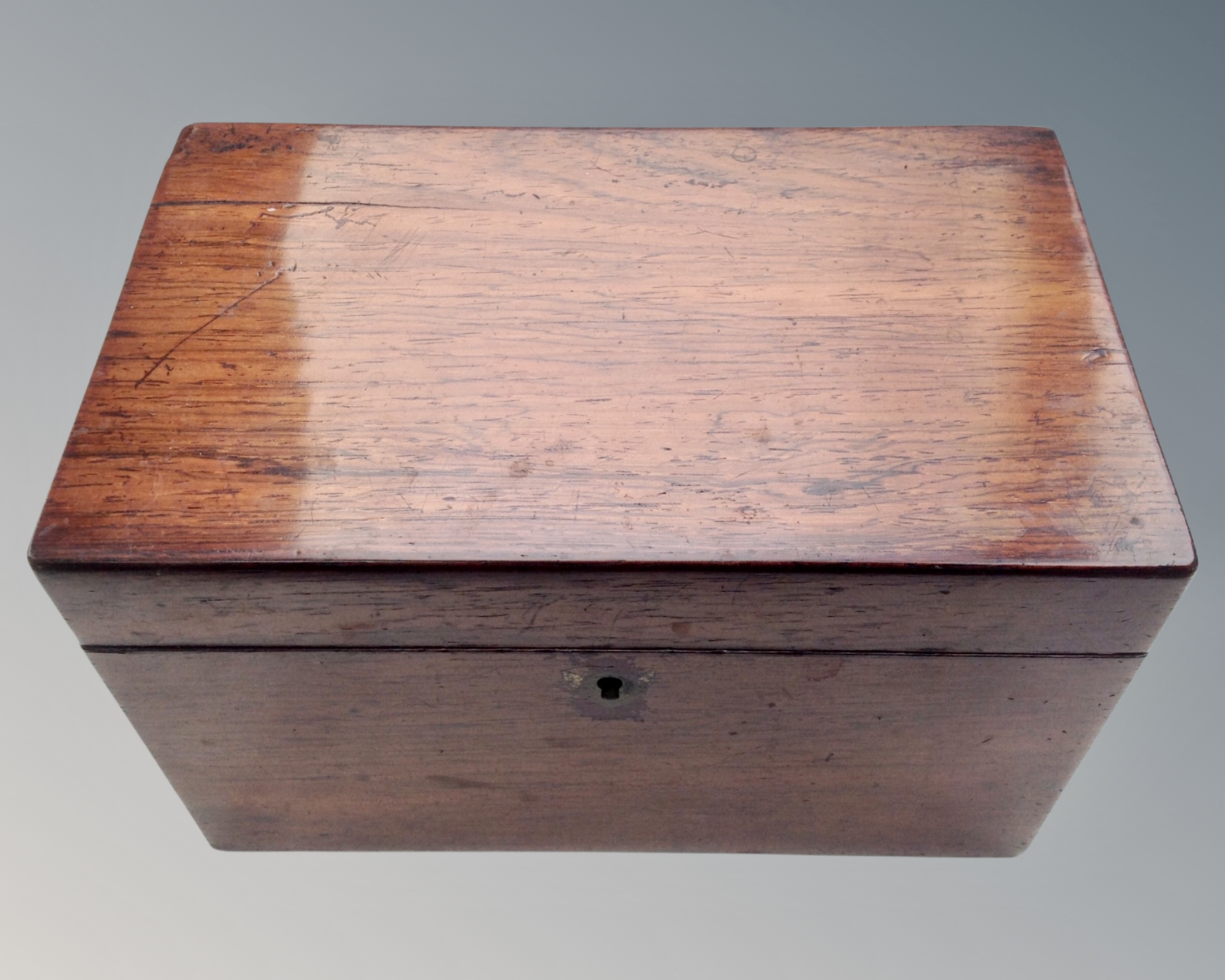 A George III rosewood tea caddy.