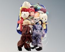 A tray containing string puppets, hand puppets etc.