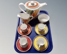 A tray of 11 pieces of Wedgwood Clarice Cliff limited edition coffee china.