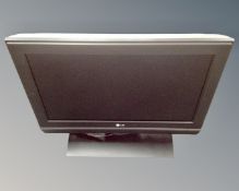 An LG 26" TV with lead, no remote.