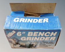 A boxed Hilka 6" bench grinder.