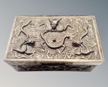 A South-East Asian heavy brass embossed cigarette box.