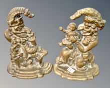 A pair of Victorian brass Punch and Judy door stops.