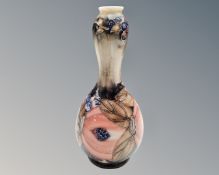 A McIntyre style porcelain vase, unsigned.