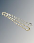 An early 20th century graduated pearl necklace, on 9ct yellow gold clasp, length 95 cm.