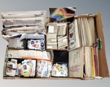 A box containing a very large quantity of cigarette cards in albums, stamps etc.