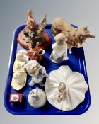 A tray containing Nao figures, Crown Ducal china cruet, Lladro hand bell etc.