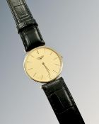 An 18ct yellow gold Gentleman's Longines quartz wristwatch, width 32mm.