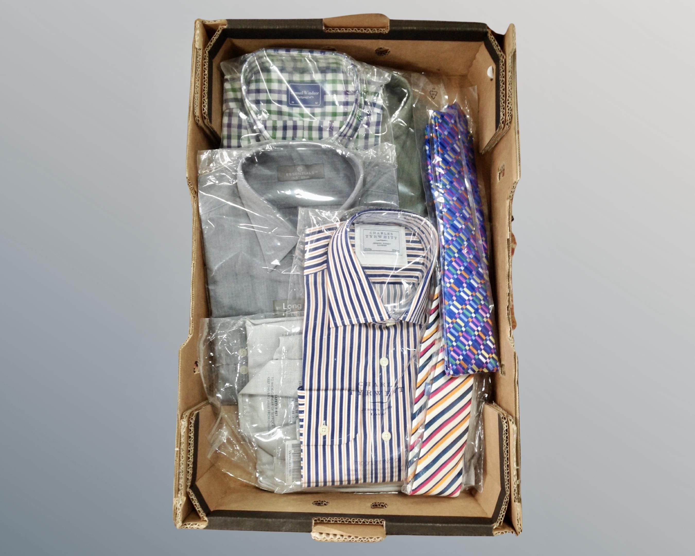 A box containing new gent's formal shirts by Charles Tyrwhitt and Samuel Windsor together with two