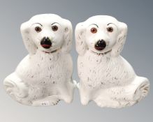 A pair of Victorian Staffordshire spaniels.