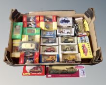 A box containing a collection of mostly boxed die cast vehicles including Corgi, Vanguards etc.