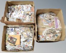 Three boxes containing a very large quantity of loose stamps.