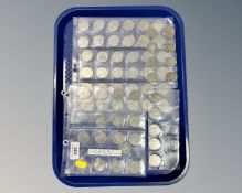 A tray containing collectible 50 pence pieces including Beatrix Potter, The Olympics,