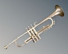 A Corton silver plated trumpet with mouthpiece.
