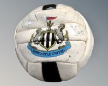 A Newcastle United signed football.