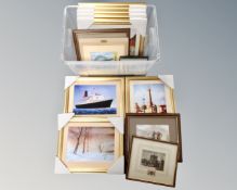A crate containing eight gilt framed contemporary prints,